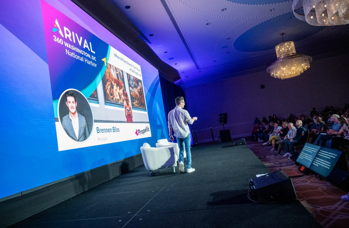Speaking at Arival. Brennen Bliss.